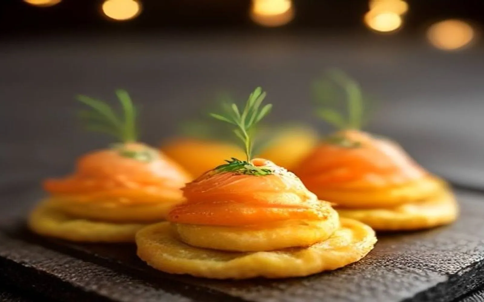 Gluten-free potato rosti bites with smoked salmon on a plate